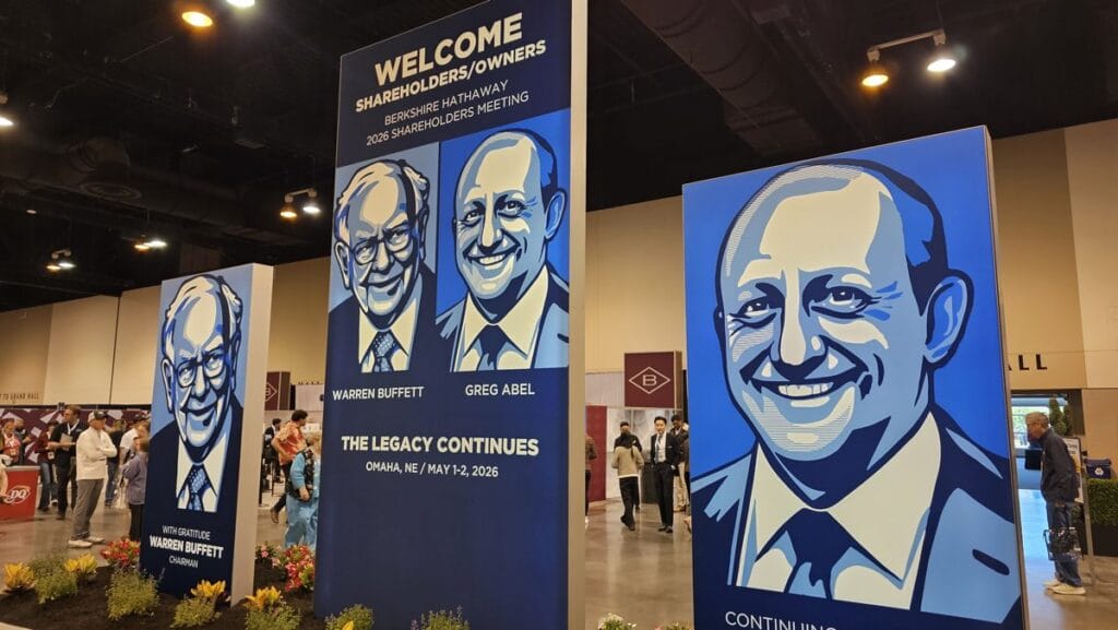 Warren Buffett and Greg Abel banners at the 2026 Berkshire Hathaway annual meeting in Omaha