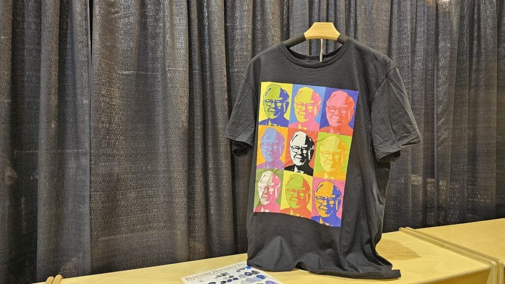T-shirt with pop art portraits of Warren Buffett on display in the exhibition hall, 2025 Berkshire Hathaway meeting