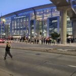 Shareholders lining up outside the CHI Health Center in Omaha at dawn before the 2026 Berkshire Hathaway annual meeting