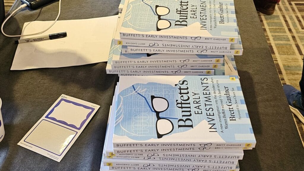Stack of Brett Gardner’s book Buffett’s Early Investments on a book table in the foyer of the Markel Omaha Brunch 2025